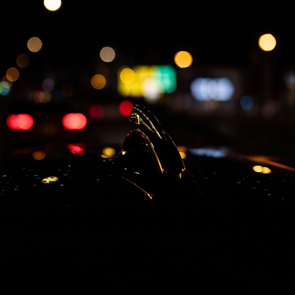 Rainy Night Drive Through the Neon Streets