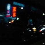 Quiet Reflections from a Taxi Window